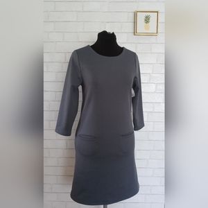 Basic Dress size  Medium color gray  brand New with out tags 2 pockets